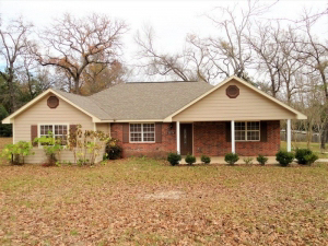4 bedroom, 2 bath brick home, 1 acre lot, close to town.